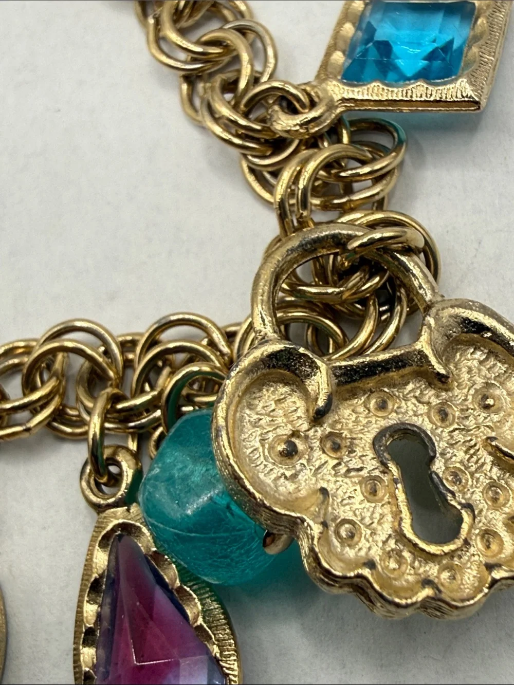 Whimsy Gold-Tone Charm Bracelet with Aqua Beads and Purple Teardrops lock & key